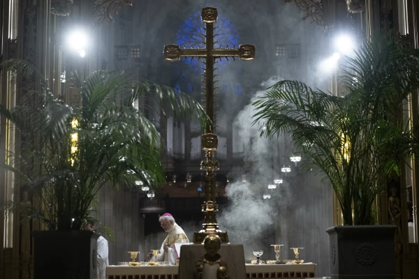 Archbishop Paul S. Coakley of Oklahoma City incenses the altar during a Mass in St. Patrick’s Cathedral in New York City ahead of a Eucharistic procession on Oct. 15, 2024. Credit: Jeffrey Bruno