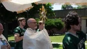 Bishop James Conley of Lincoln carries the Eucharist through Nebraska.