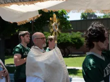 Bishop James Conley of Lincoln carries the Eucharist through Nebraska.