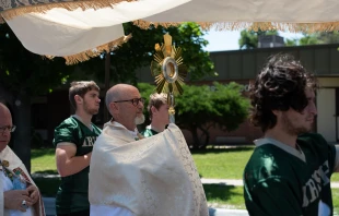 Bishop James Conley of Lincoln carries the Eucharist through Nebraska. Credit: Jeffrey Bruno