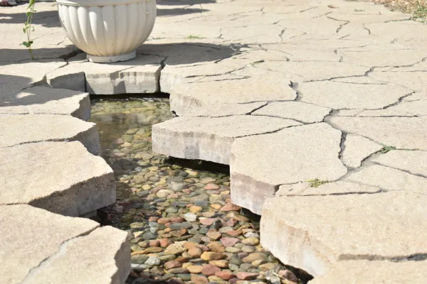 The entrance of the Holy Family Shrine near Omaha, Nebraska, is marked by a cracked path with a pebbled waterway just under the surface. Credit: Kate Quiñones/CNA