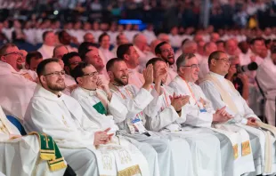 Priests respond to a talk at the National Eucharistic Congress in Indianapolis on July 18, 2024. Credit: Photo by Josh Applegate, in partnership with the National Eucharistic Congress