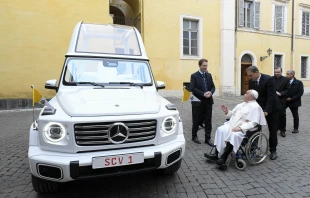 Pope Francis is shown the new popemobile, an electric Mercedes, on Dec. 4, 2024, at the Vatican. Credit: Vatican Media