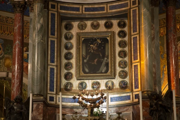 A close-up of the image of Our Lady of Pompeii inside the Shrine of the Blessed Virgin Mary of the Holy Rosary in Pompeii, Italy. Credit: DyziO/Shutterstock