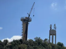 The preparation of the crane at the Tower of Our Lady of the East to install the statue of the Virgin Mary on Sunday, Aug. 5, 2024.