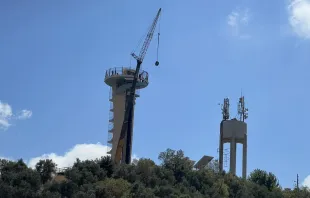 The preparation of the crane at the Tower of Our Lady of the East to install the statue of the Virgin Mary on Sunday, Aug. 5, 2024. Credit: Moussa Hanna Photography