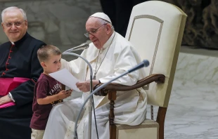 Pope Francis with a surprise visitor on stage at the General Audience in the Vatican on Aug. 17, 2022 Pablo Esparza / CNA