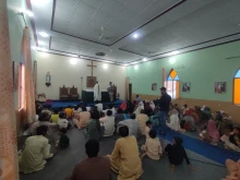 A missionary priest of the Order of St. Elijah celebrates a Mass attended by Christians liberated from slavery in a small chapel in Pakistan.