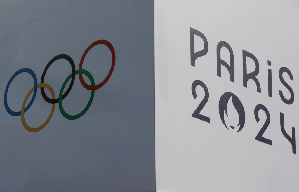 A banner bears the signs of the 2024 Paris Olympic Games and the Olympic Rings at the Trocadero in Paris on July 14, 2024.?w=200&h=150