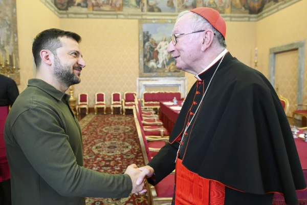 Ukraine President Volodymyr Zelenskyy shakes hands with Vatican Secretary of State Cardinal Pietro Parolin during a meeting at the Vatican on Friday, Oct. 11, 2024. Credit: Vatican Media