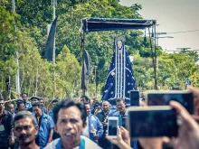 The Tuan Ma statue is paraded around Larantuka City during the Semana Santa Holy Week celebrations on Indonesia’s Flores island.