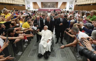Pope Francis greets participants in a gathering of choir singers, musicians, and directors at Paul VI Hall at the Vatican on June 8, 2024. Credit: Vatican Media