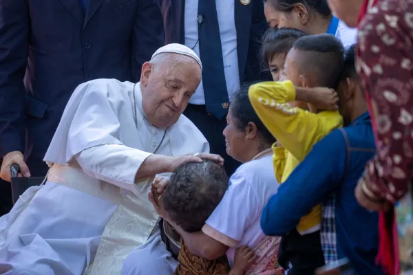 Pope Francis blesses a child at the Irmas Alma School in Timor-Leste on Tuesday, Sept. 10, 2024. Credit: Daniel Ibáñez/CNA