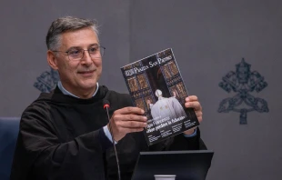 Father Enzo Fortunato, OFM Conv., communications director for St. Peter’s Basilica, holds up a copy of the first issue of the Vatican's new monthly magazine, “Piazza San Pietro.” Credit: Daniel Ibáñez/EWTN News