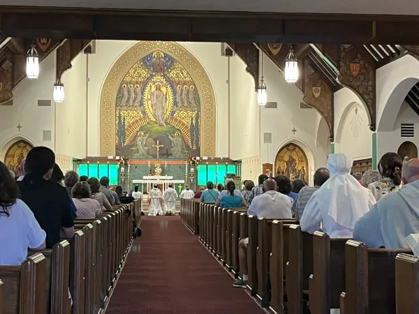 Catholics kneel before the Eucharist at the Resurrection Church of St. Teresa of Kolkata Parish in Pittsburgh before the start of the procession. Credit: Tyler Arnold/CNA