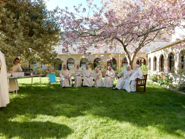 Pluscarden Abbey's community of Benedictine monks in the cloister. Credit: Giles Conacher OSB/Pluscarden Abbey