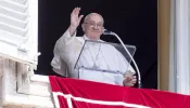 Pope Francis waves to pilgrims gathered in St. Peter’s Square at the Vatican for his Angelus address on the solemnity of the Assumption on Aug. 15, 2024.