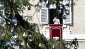 Pope Francis leads the Angelus prayer and delivers an address from a window in the Apostolic Palace on Dec. 26, 2024, at the Vatican.