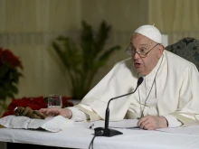 Pope Francis delivers his Angelus address via a video livestream from his Casa Santa Marta residence within the Vatican due to a cold on Sunday, Dec. 22, 2024.