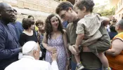 Pope Francis blesses a pregnant woman during a visit with families from St. Bridget of Sweden Parish in Rome’s Palmarola neighborhood on June 6, 2024.
