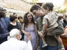 Pope Francis blesses a pregnant woman during a visit with families from St. Bridget of Sweden Parish in Rome’s Palmarola neighborhood on June 6, 2024.