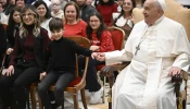 Pope Francis meets with members of the Italian Union of Blind and Partially Sighted People on Jan. 3, 2025, in Clementine Hall at the Vatican.