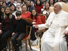 Pope Francis meets with members of the Italian Union of Blind and Partially Sighted People on Jan. 3, 2025, in Clementine Hall at the Vatican.