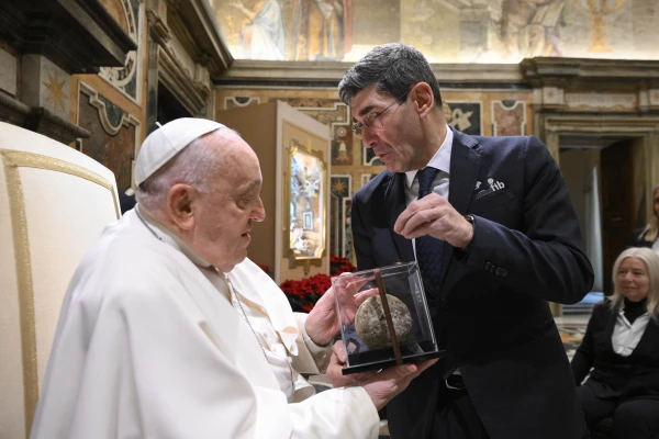 Pope Francis receives a gift during an audience with representatives of the Italian Bowling Federation on Dec. 20, 2024, praising its social aspects and emphasizing that, unlike other sports dominated by billionaire stars, bocce allows “normal people” to excel. Credit: Vatican Media