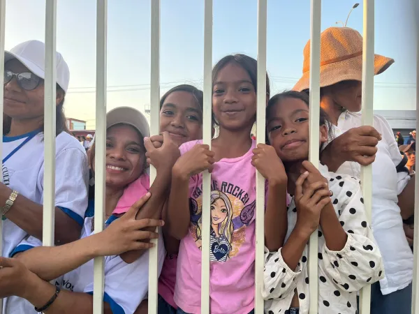 Crowds of young people line the streets of Dili, East Timor, for miles to greet Pope Francis upon his arrival to the country on Sept. 9, 2024. Credit: Courtney Mares/CNA