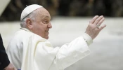 Pope Francis waves to pilgrims gathered in the Paul VI Audience Hall for his Wednesday general audience on Jan. 15, 2025, at the Vatican.