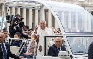 Pope Francis waves to the crowds gathered in St. Peter’ Square as he arrives for his general audience on Wednesday, Oct. 23, 2024, at the Vatican. Credit: Daniel Ibañez/CNA