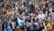 Pope Francis greets pilgrims gathered in St. Peter’s Square for his Wednesday general audience on Nov. 20, 2024, at the Vatican.