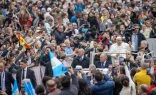 Pope Francis greets pilgrims gathered in St. Peter’s Square for his Wednesday general audience on Nov. 20, 2024, at the Vatican.