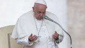 Pope Francis prays during his Wednesday general audience in St. Peter’s Square at the Vatican on Oct. 9, 2024.