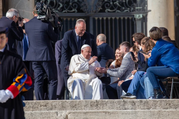 Pope Francis blesses pilgrims gathered in St. Peter’s Square for his Wednesday general audience on Nov. 6, 2024, at the Vatican. Credit: Julia Cassell/CNA