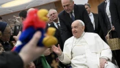 Pope Francis greets pilgrims gathered in the Paul VI Audience Hall for his Wednesday general audience on Jan. 15, 2025, at the Vatican.