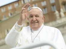 Pope Francis waves to pilgrims gathered in St. Peter’s Square for his Wednesday general audience on May 8, 2024.