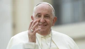 Pope Francis waves to pilgrims at his Wednesday general audience in St. Peter’s Square at the Vatican on Oct. 9, 2024.