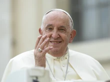 Pope Francis waves to pilgrims at his Wednesday general audience in St. Peter’s Square at the Vatican on Oct. 9, 2024.