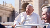 Pope Francis shakes hands with pilgrims gathered in St. Peter’s Square for his Wednesday general audience on Nov. 6, 2024, at the Vatican.