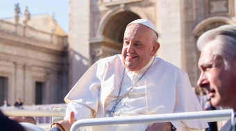 Pope Francis shakes hands with pilgrims gathered in St. Peter’s Square for his Wednesday general audience on Nov. 6, 2024, at the Vatican.