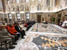 Pope Francis meets with the delegations of the Diocese of Aosta, Italy, and the Congregation of the Canons of Great Saint Bernard on Nov. 11, 2024, in the Apostolic Palace at the Vatican.