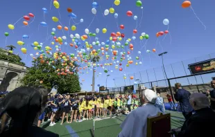 The kids and Pope Francis released biodegradable balloons into the sky together on July 18, 2024. The Vatican said the message, “You, dear boy, dear girl, are precious in God’s eyes,” was stamped on the balloons “with the hope that the message will reach as many people as possible.” Credit: Vatican Media