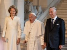 Pope Francis arrives at Laeken Castle in Belgium on Friday, Sept. 27, 2024, where he is greeted by the Belgian royal family, Queen Mathilde and King Philippe.