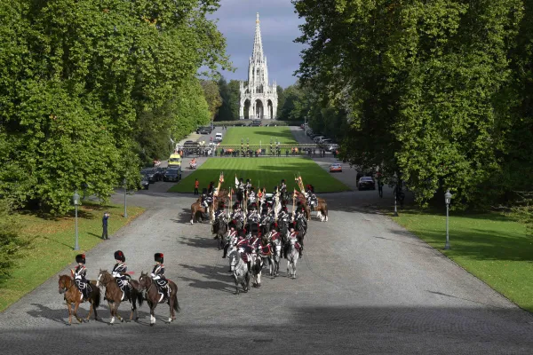 A mounted guard of honor accompanies Pope Francis as he arrives at Laeken Castle in Belgium on Friday, Sept. 27, 2024, where he was greeted by the Belgian royal family. Credit: Vatican Media