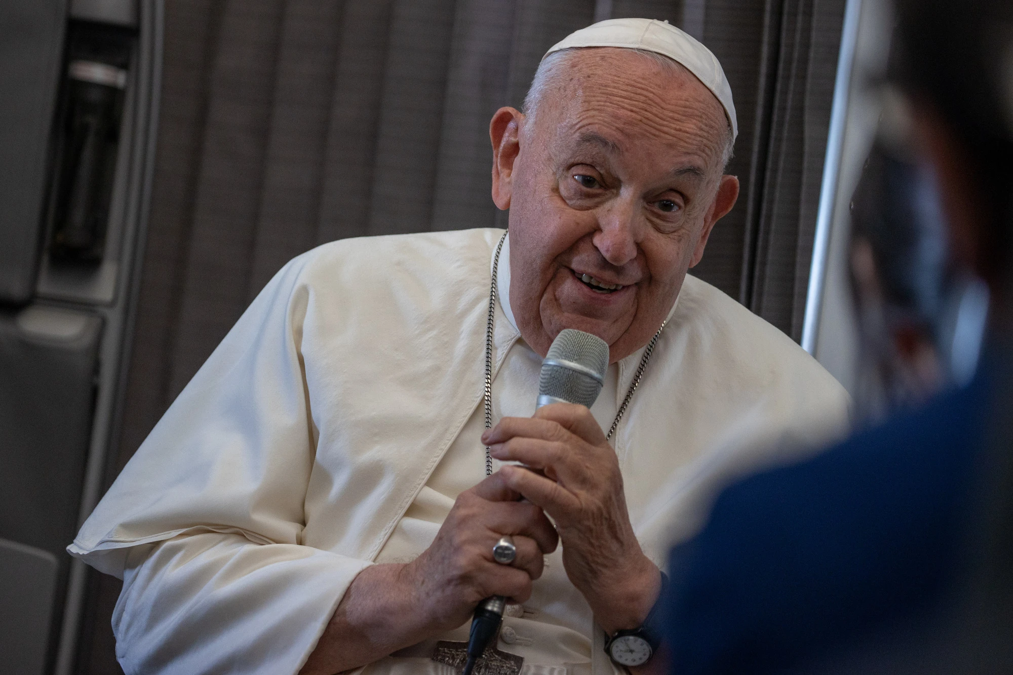 Pope Francis speaks to journalists aboard the papal plane during an in-flight press conference on Friday, Sept. 13, 2024, on his return from his nearly two-week tour of Southeast Asia.?w=200&h=150