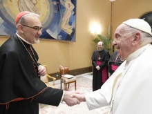 Pope Francis meets with Cardinal Pierbattista Pizzaballa, the Latin patriarch of Jerusalem, at a meeting with other Arab bishops on Aug. 28, 2024, at the Vatican.