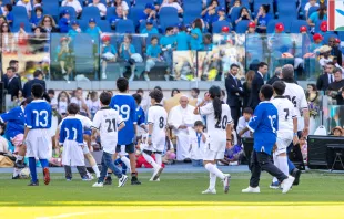 Pope Francis watches a friendly soccer game between Italian professional soccer players with children clad in uniforms as part of the first World Children’s Day on May 25, 2024, at Olympic Stadium in Rome. Credit: Daniel Ibañez/CNA