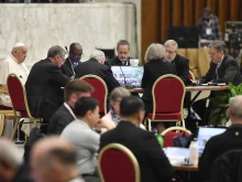 Pope Francis meets with other delegates of the Synod on Synodality at a roundtable discussion in Paul VI Hall at the Vatican on Oct. 17, 2024.