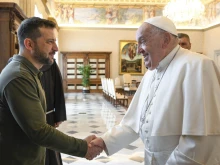 Ukraine President Volodymyr Zelenskyy shakes hands with Pope Francis during a meeting at the Vatican on Friday, Oct. 11, 2024.